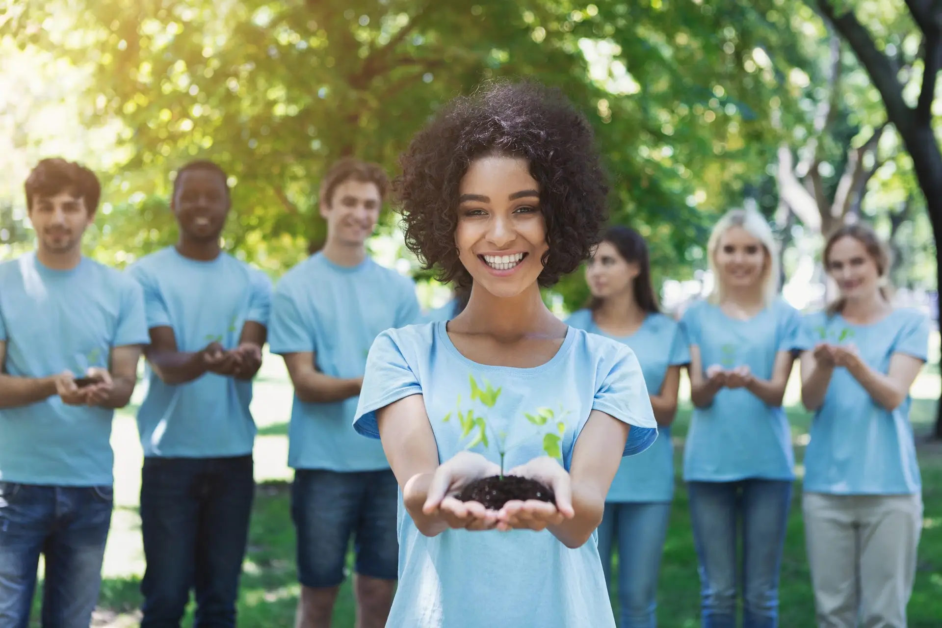 Group of volunteer with trees for growing